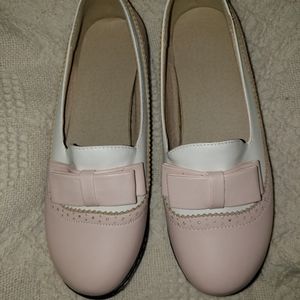 Pink and white shoes